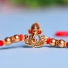 Colourful Ganesha Beads Rakhi Duo